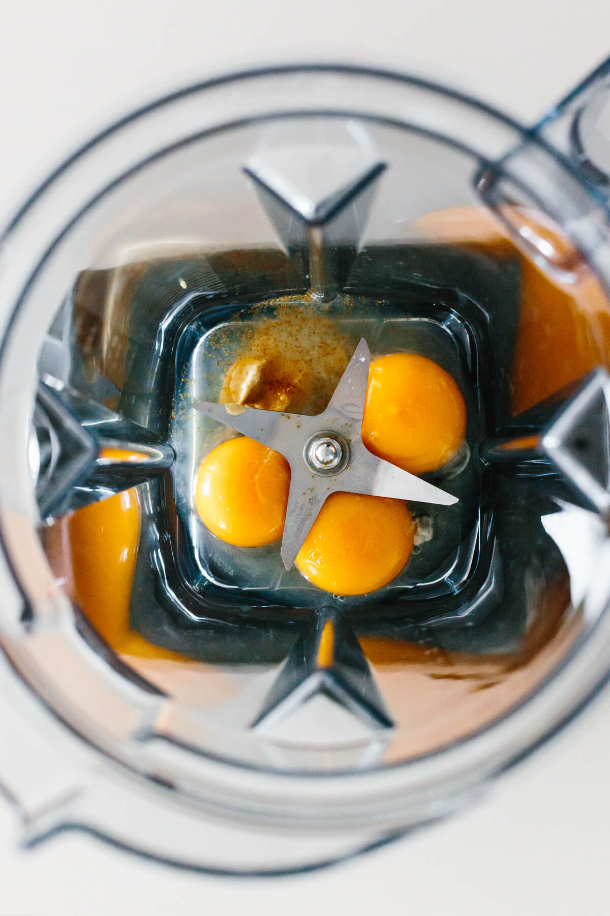 Hollandaise sauce is a classic creamy sauce that's perfect for brunch and comes together with 5 simple ingredients. It's easy in a blender! Hollandaise sauce ingredients in a blender.