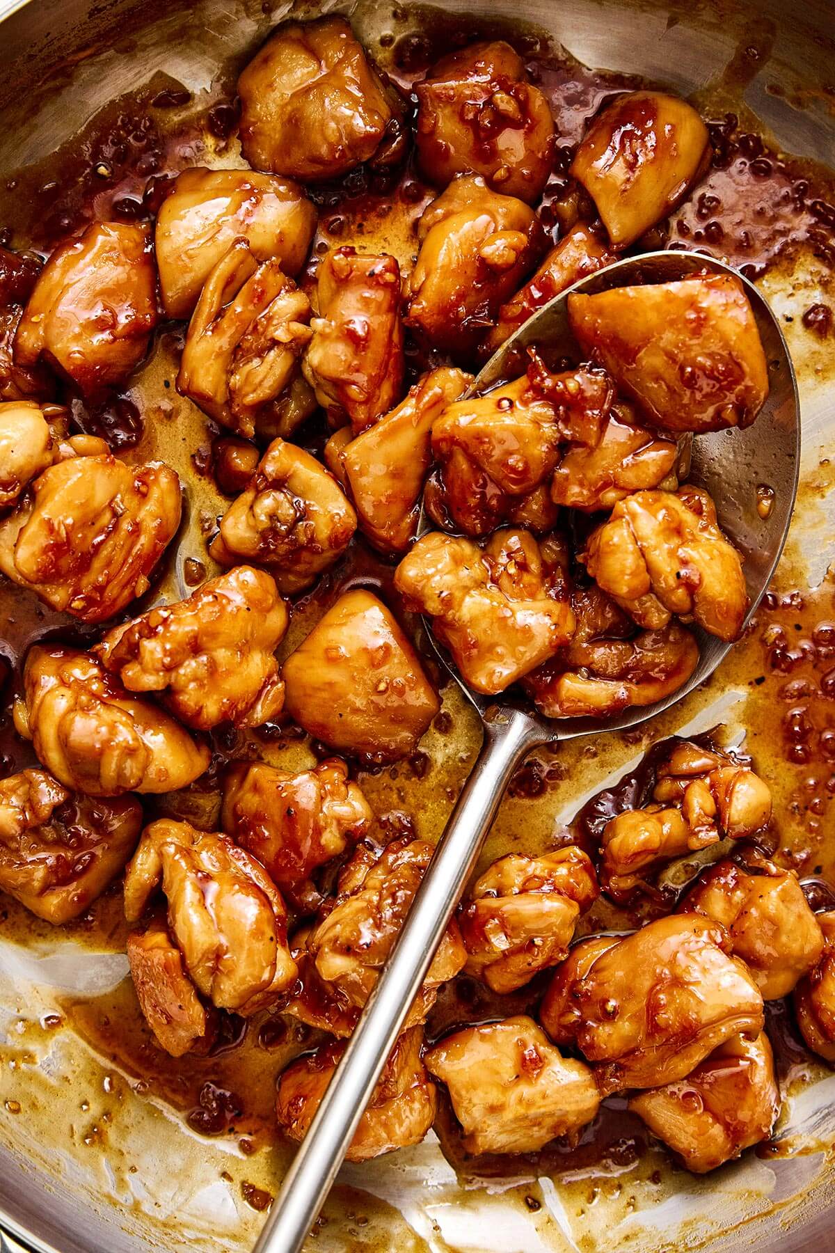 Teriyaki chicken in a pan.