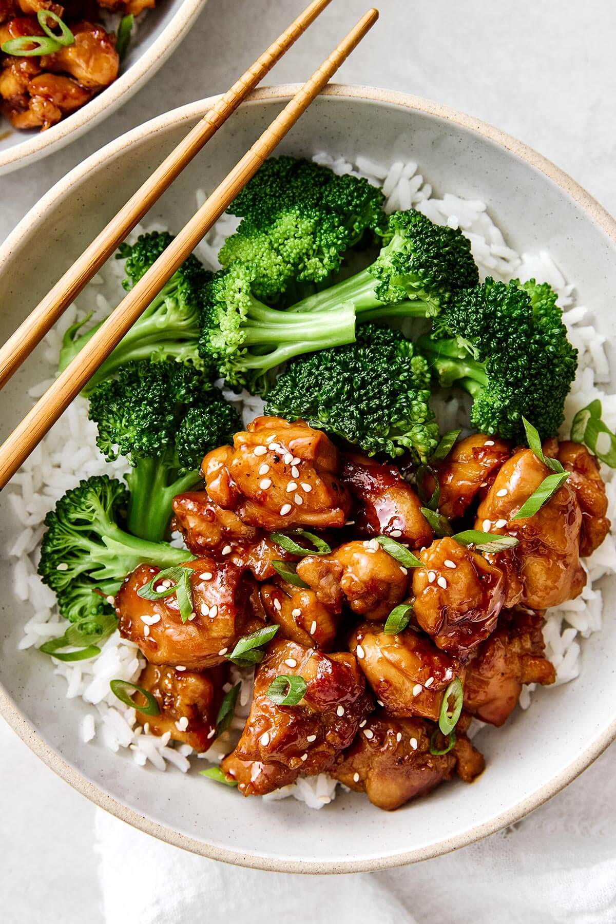 Teriyaki chicken with steamed broccoli and rice.