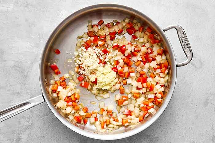 Cooking veggies in a pan.