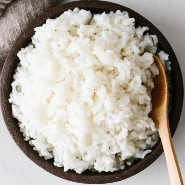 Cooked rice from the stove in a bowl.