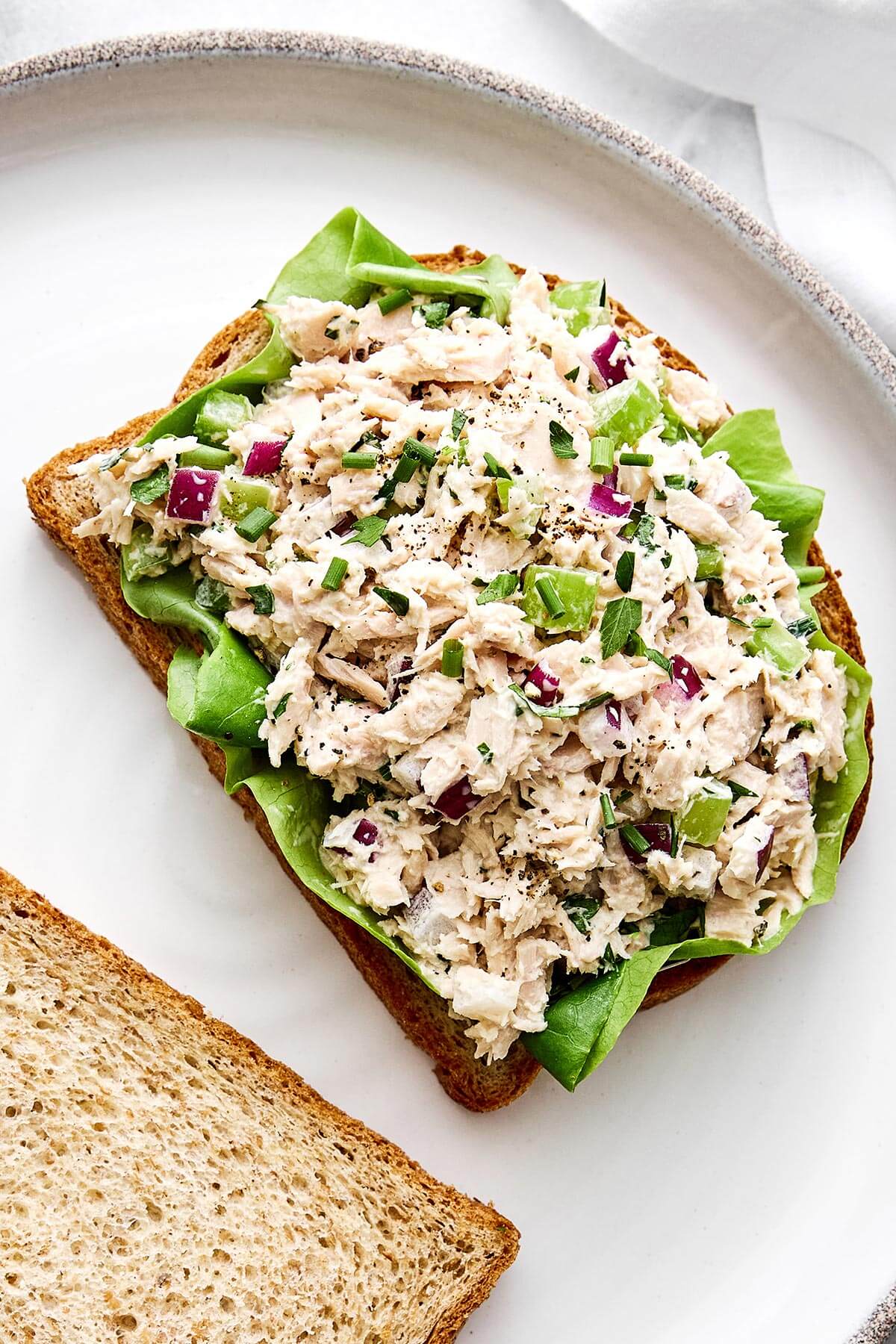 Tuna salad on a piece of toast.