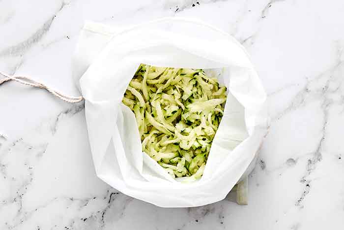 Grated zucchini in a bag.