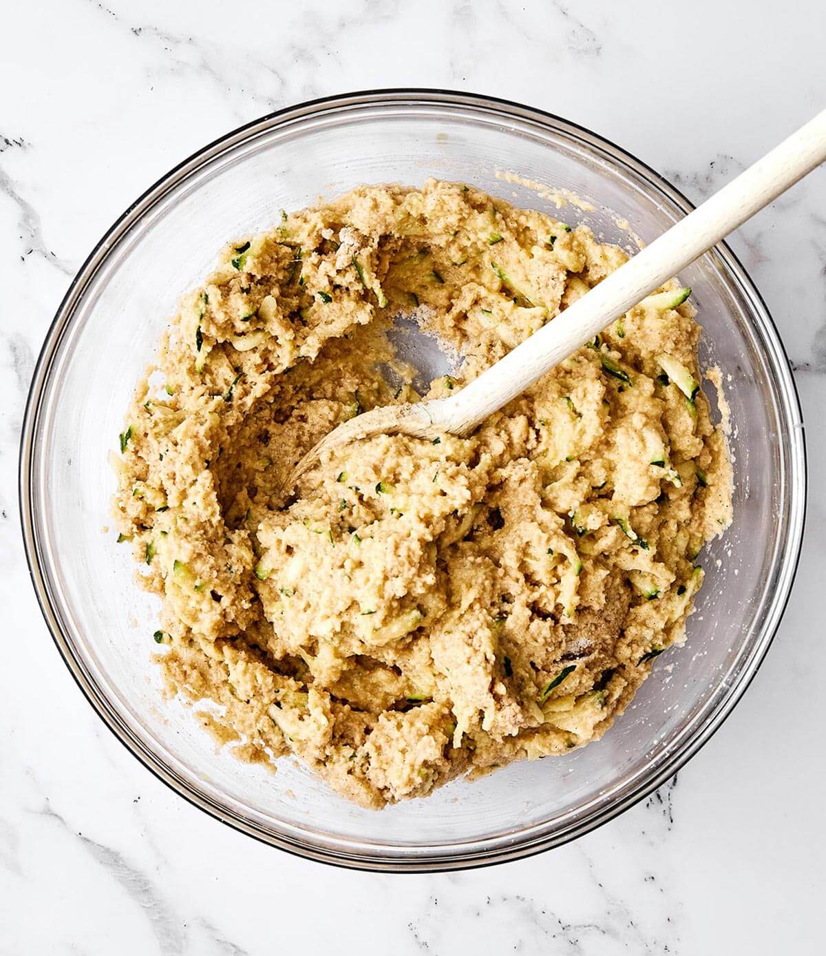 Mixing zucchini bread dough.