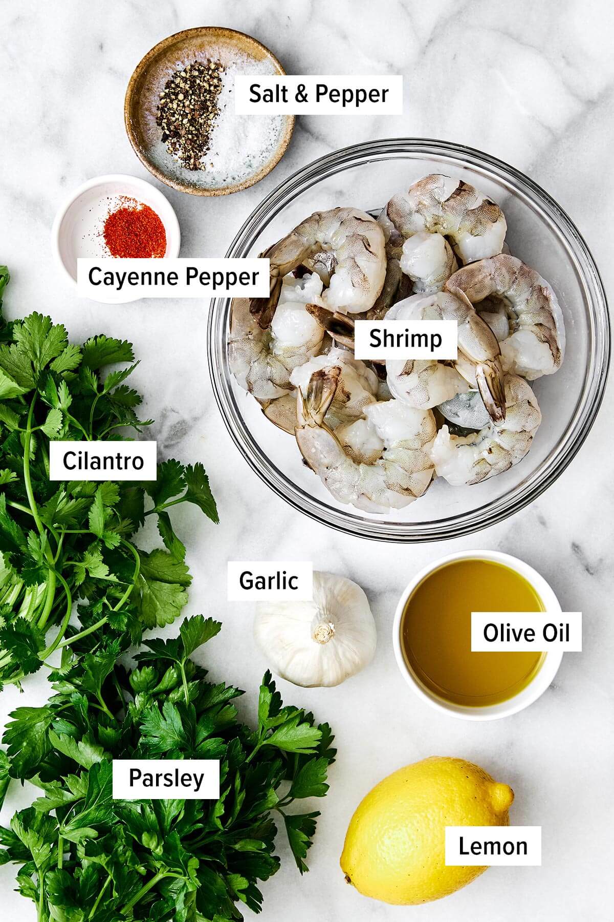 This grilled shrimp is a quintessential summertime grilling recipe! It's made with the best shrimp marinade and is perfect for your next BBQ. Ingredients for garlic grilled shrimp.