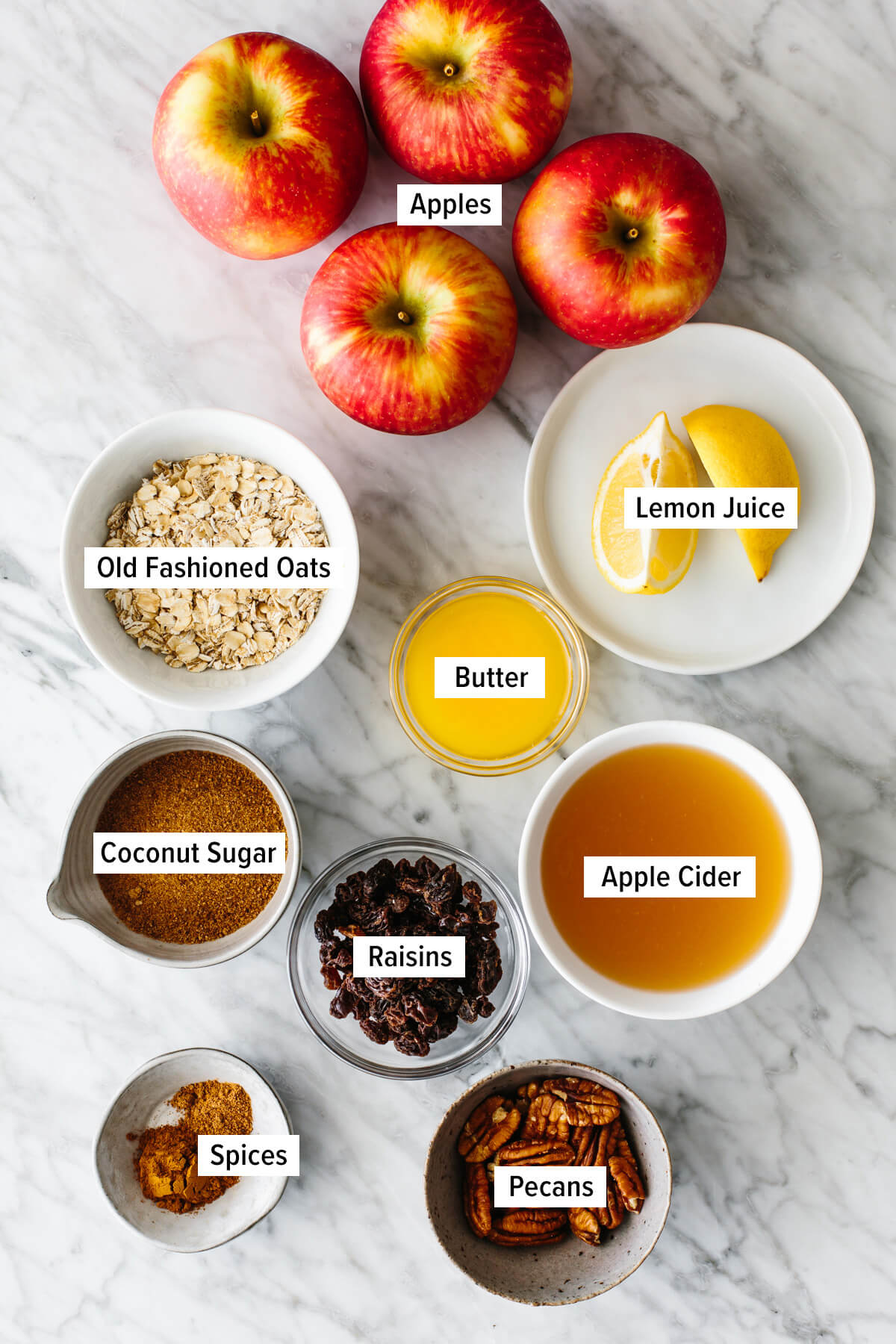 Ingredients for baked apples on a table.