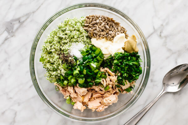 Ingredients for broccoli tuna salad in a bowl.