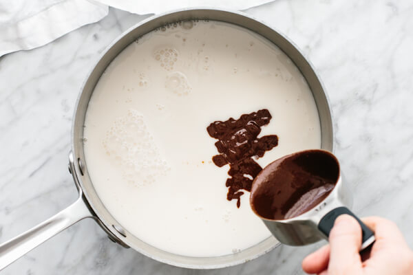 Adding nutella into a pan for Nutella hot chocolate