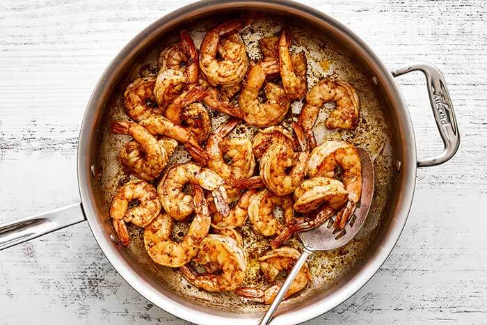 Cooked shrimp in a pan.