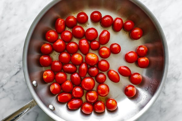 Cherry tomatoes in a pan for blistered tomatoes