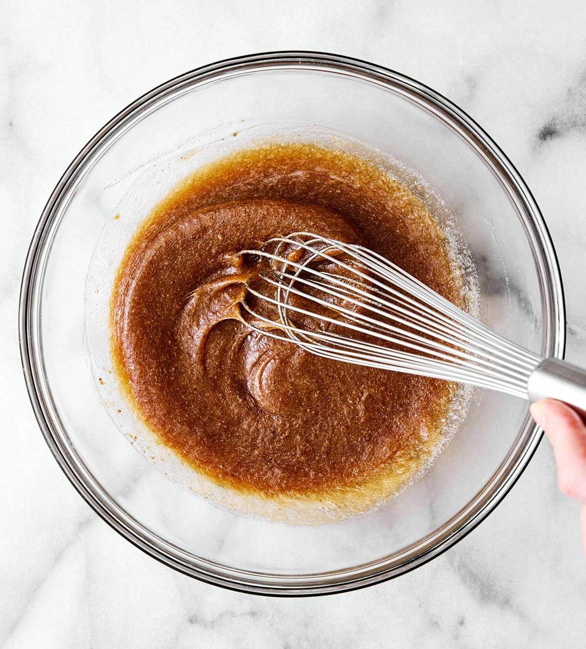 These are everything you want in a healthy oatmeal cookie! They're soft and chewy, perfectly spiced, and dotted with raisins. Mixing cookie wet ingredients.