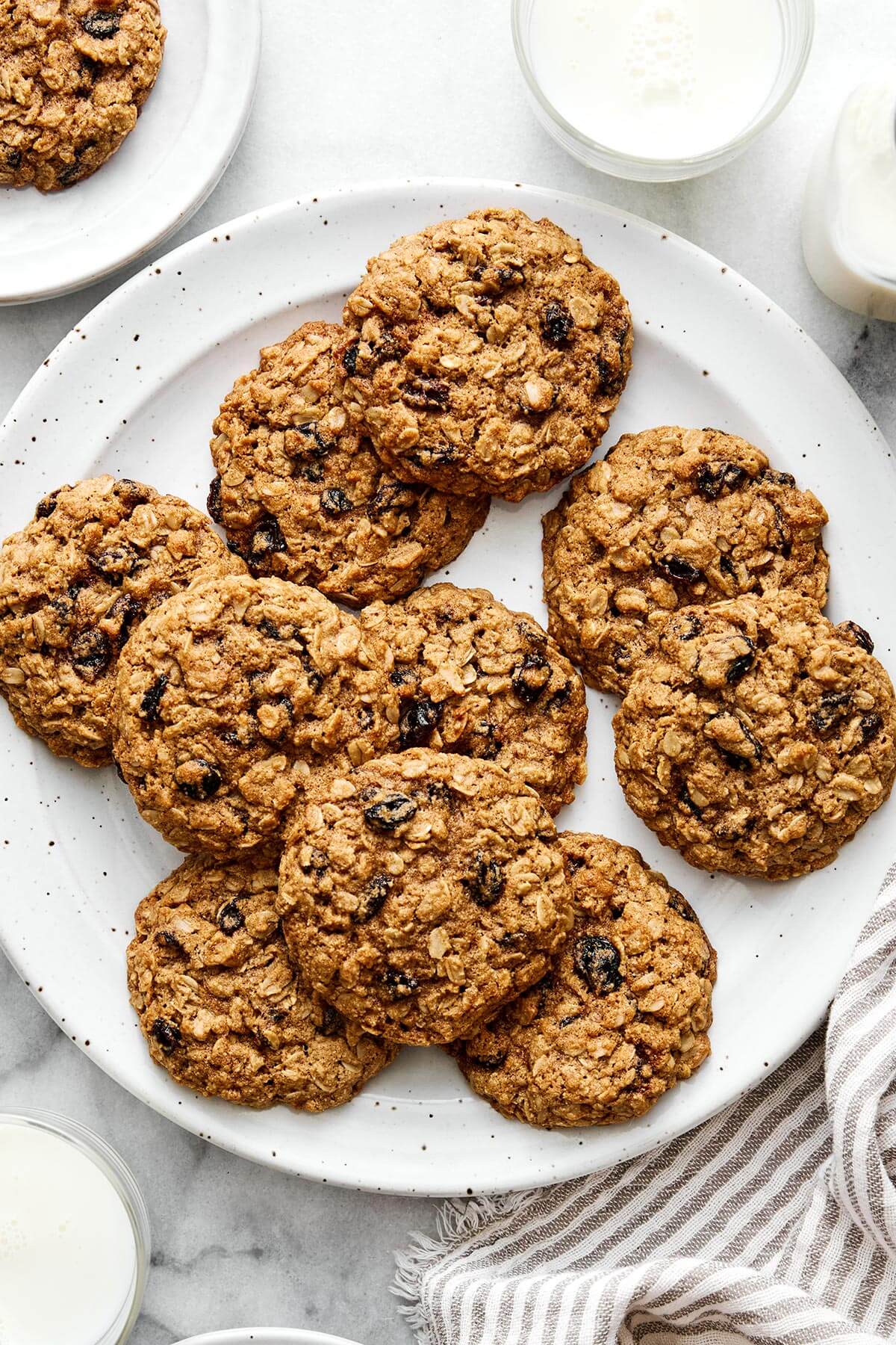 These are everything you want in a healthy oatmeal cookie! They're soft and chewy, perfectly spiced, and dotted with raisins. Healthy oatmeal raisin cookies.