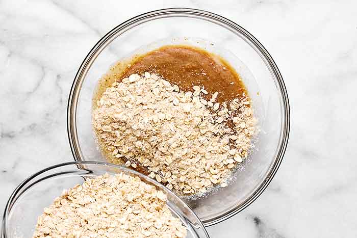 Mixing oatmeal cookie ingredients.