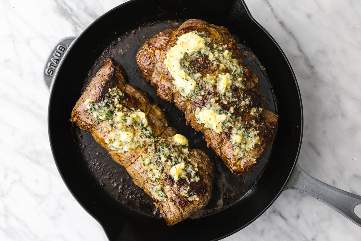 Beef tenderloin in a pan before roasting