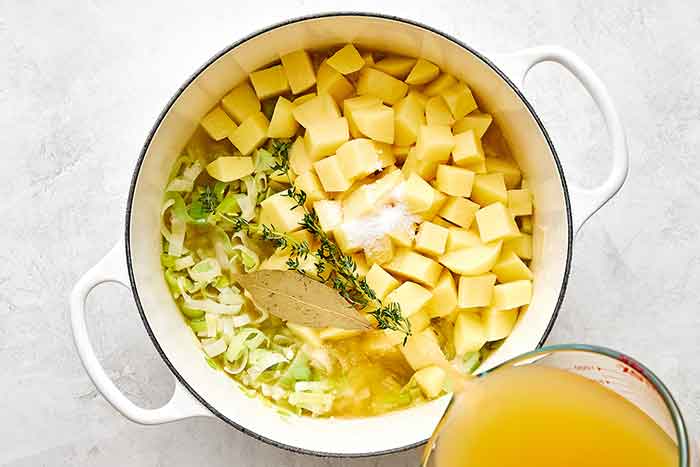 Cooking potato leek soup.