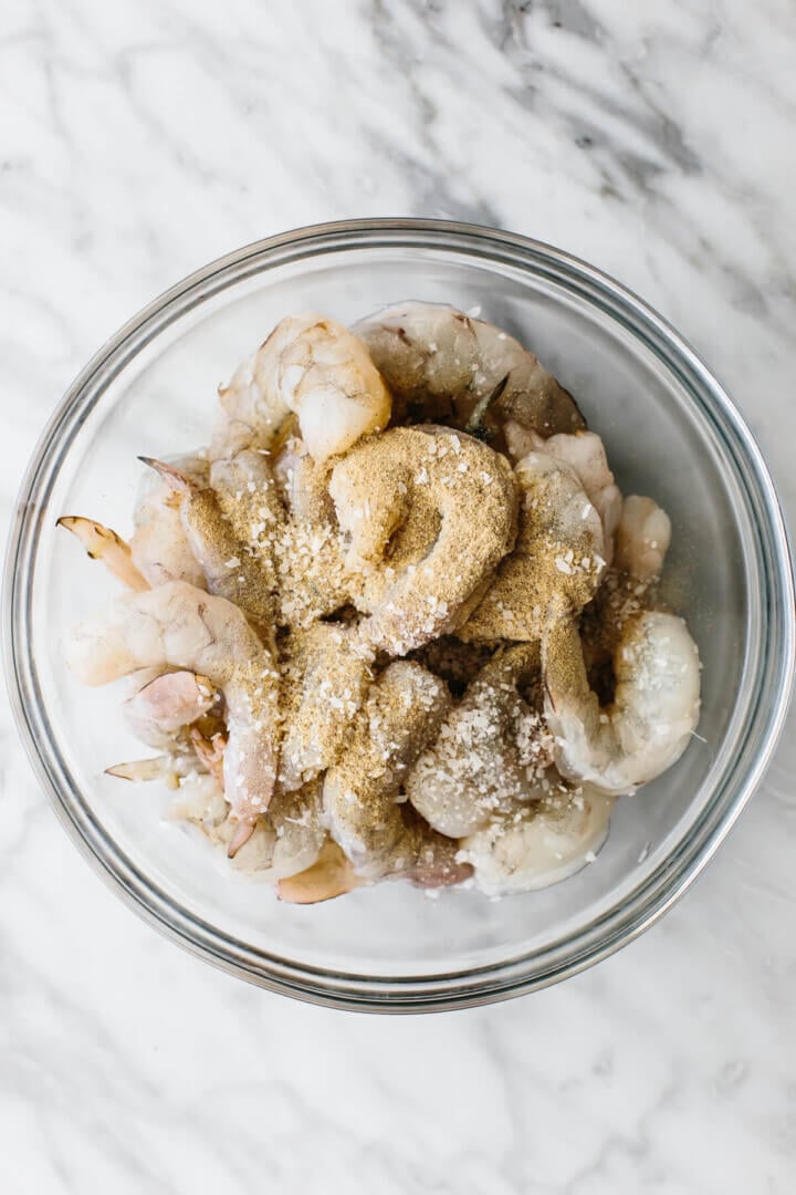 Seasoning shrimp in a bowl for shrimp fried rice