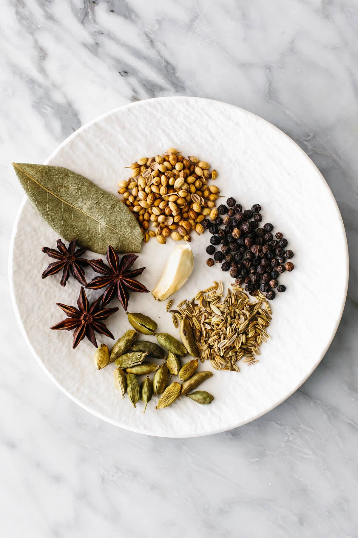 Spices on a plate for pickled red onions