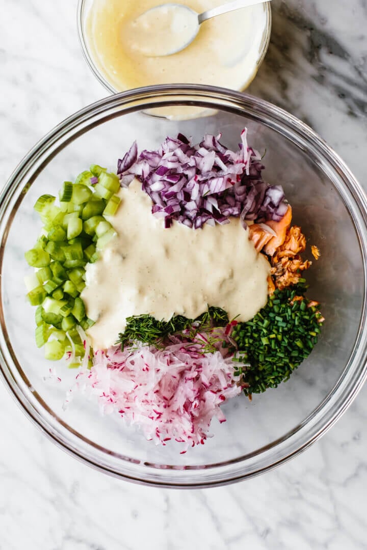 Salmon salad ingredients in a large bowl