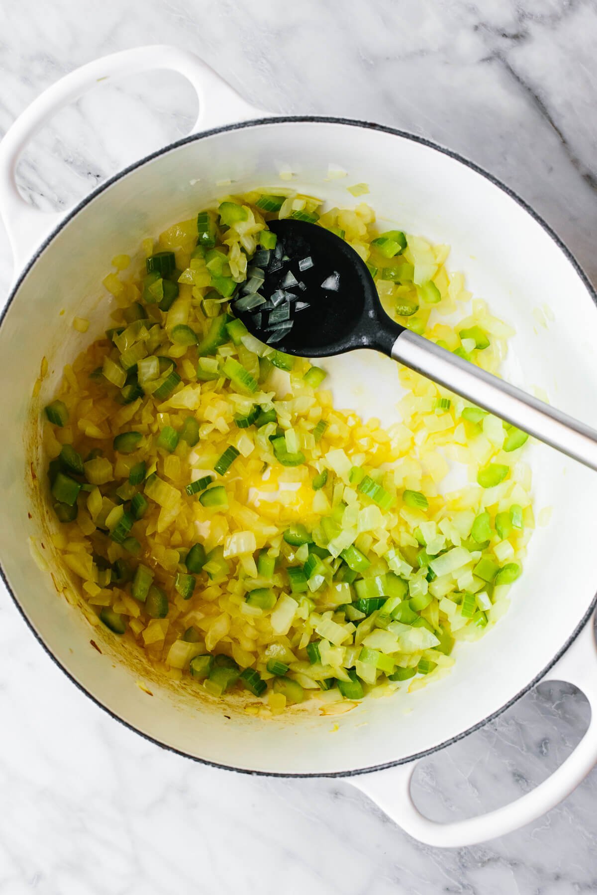 If you love a good chicken and rice combo, this Greek Avgolemono soup is the most comforting, delicious, and easy way to make it! Cooking vegetables in a pot for Avgolemono soup