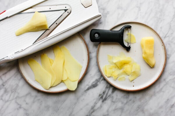 Slicing quick pickled ginger with a mandoline