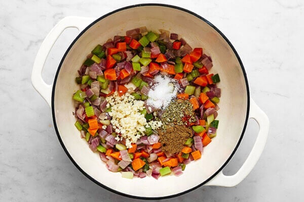 A pot with veggies for black bean soup