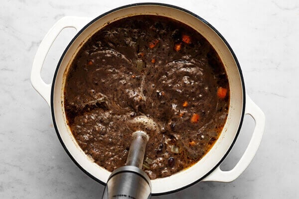 Blended black bean soup in a pot