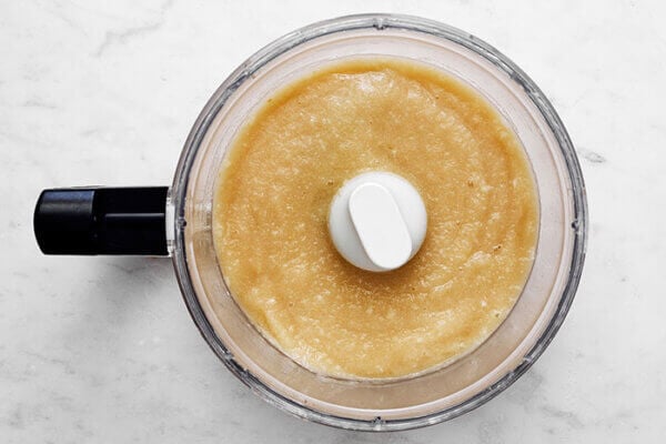 Pear puree in a food processor for spiced pear souffle
