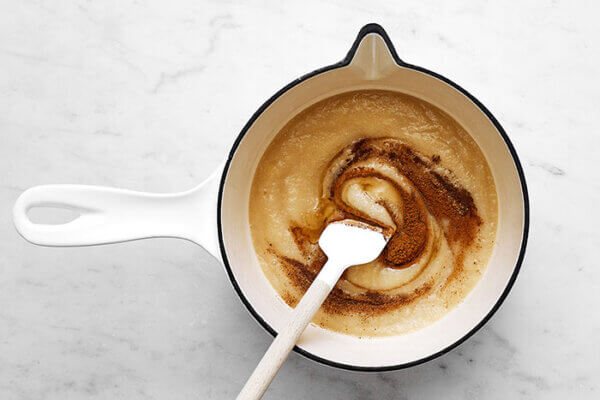 Mixing up puree and spices for spiced pear souffle