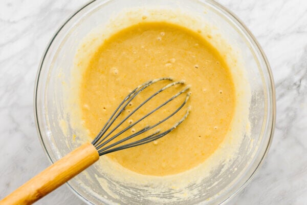 Whisking batter for cranberry orange muffins