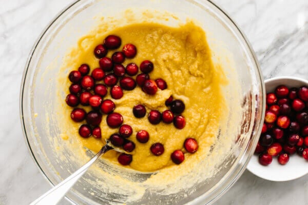 Batter with cranberries for cranberry orange muffins