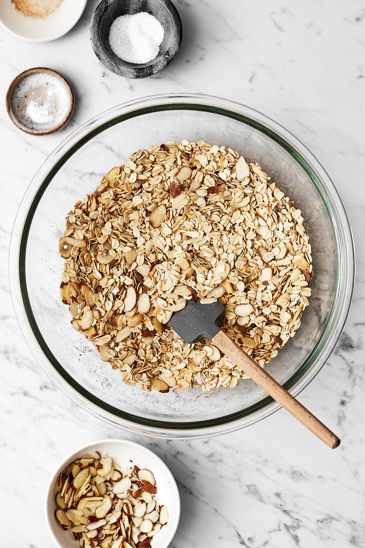Mixing baked oatmeal dry ingredients in a bowl