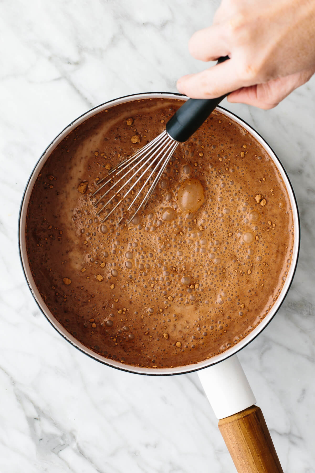 Making hot chocolate in a pot.