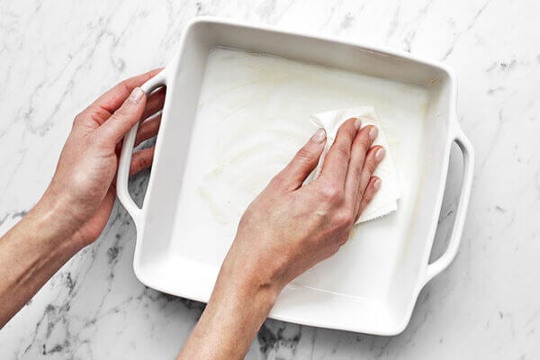 Greasing baking dish for berry baked oatmeal