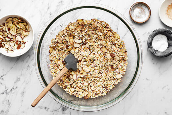A bowl of dry ingredients for berry baked oatmeal