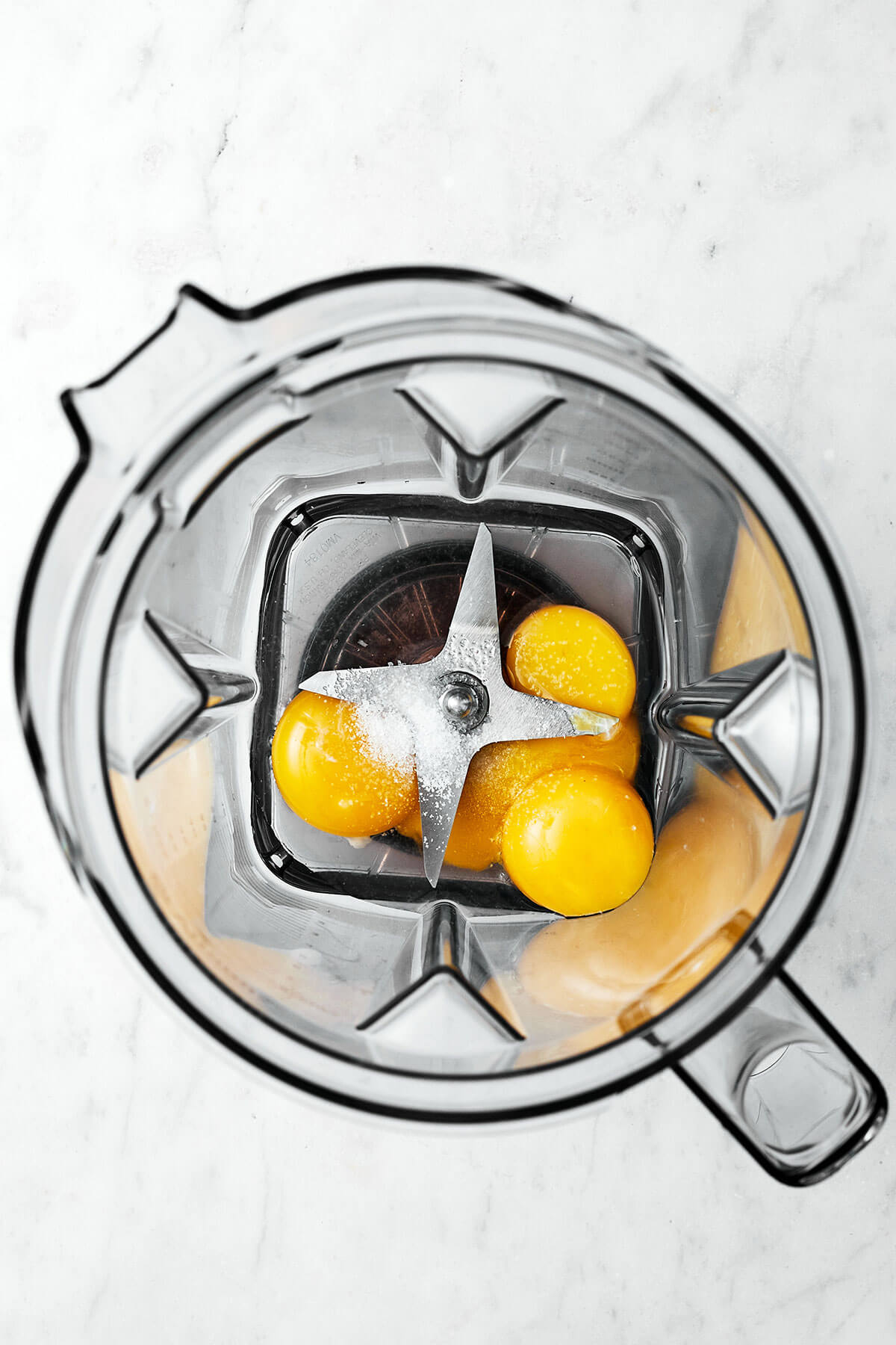 A drizzle of this easy béarnaise sauce will instantly elevate any dish! It has a luxurious butter wine base with hints of fresh tarragon. Blending up egg base for bearnaise sauce