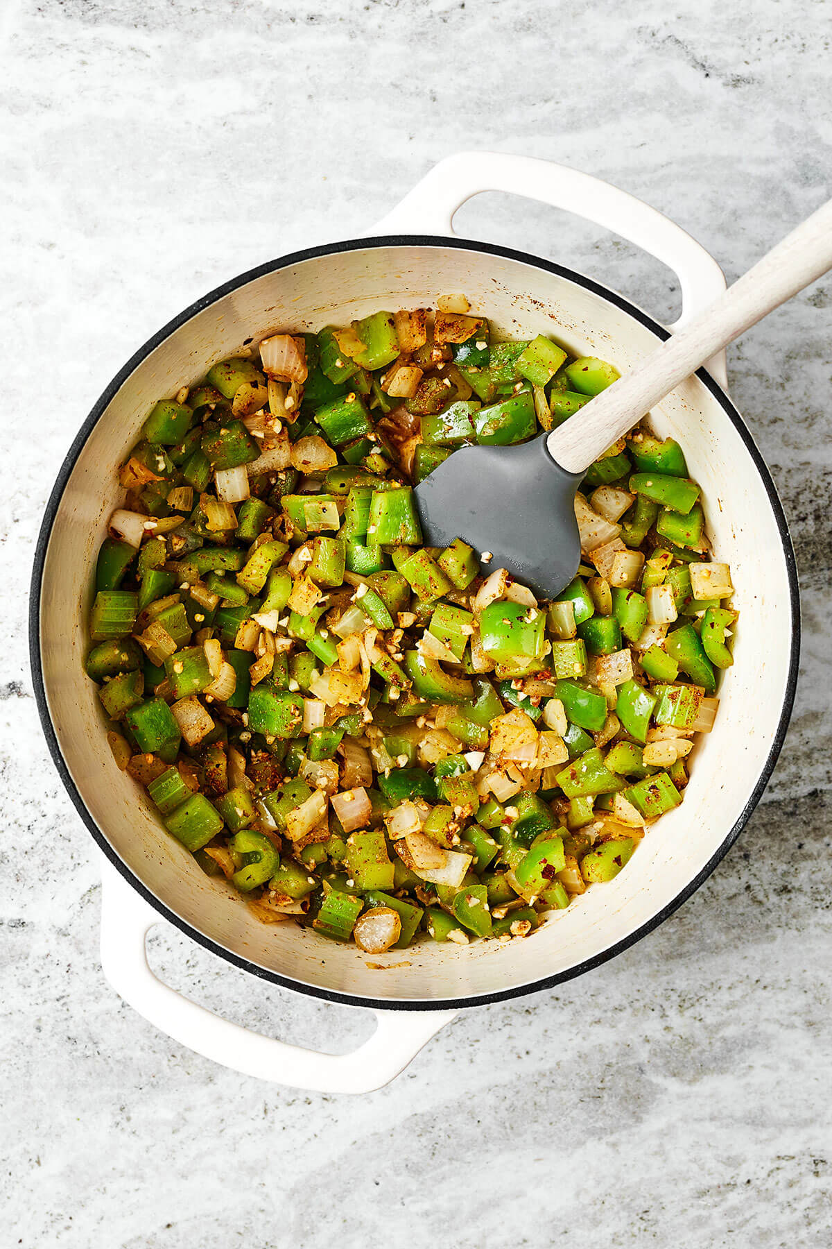 Cooking veggies in a pot for jambalaya