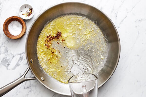 Making garlic butter sauce for shrimp scampi