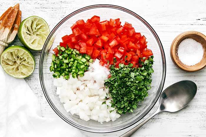 Pico de gallo ingredients in a bowl.
