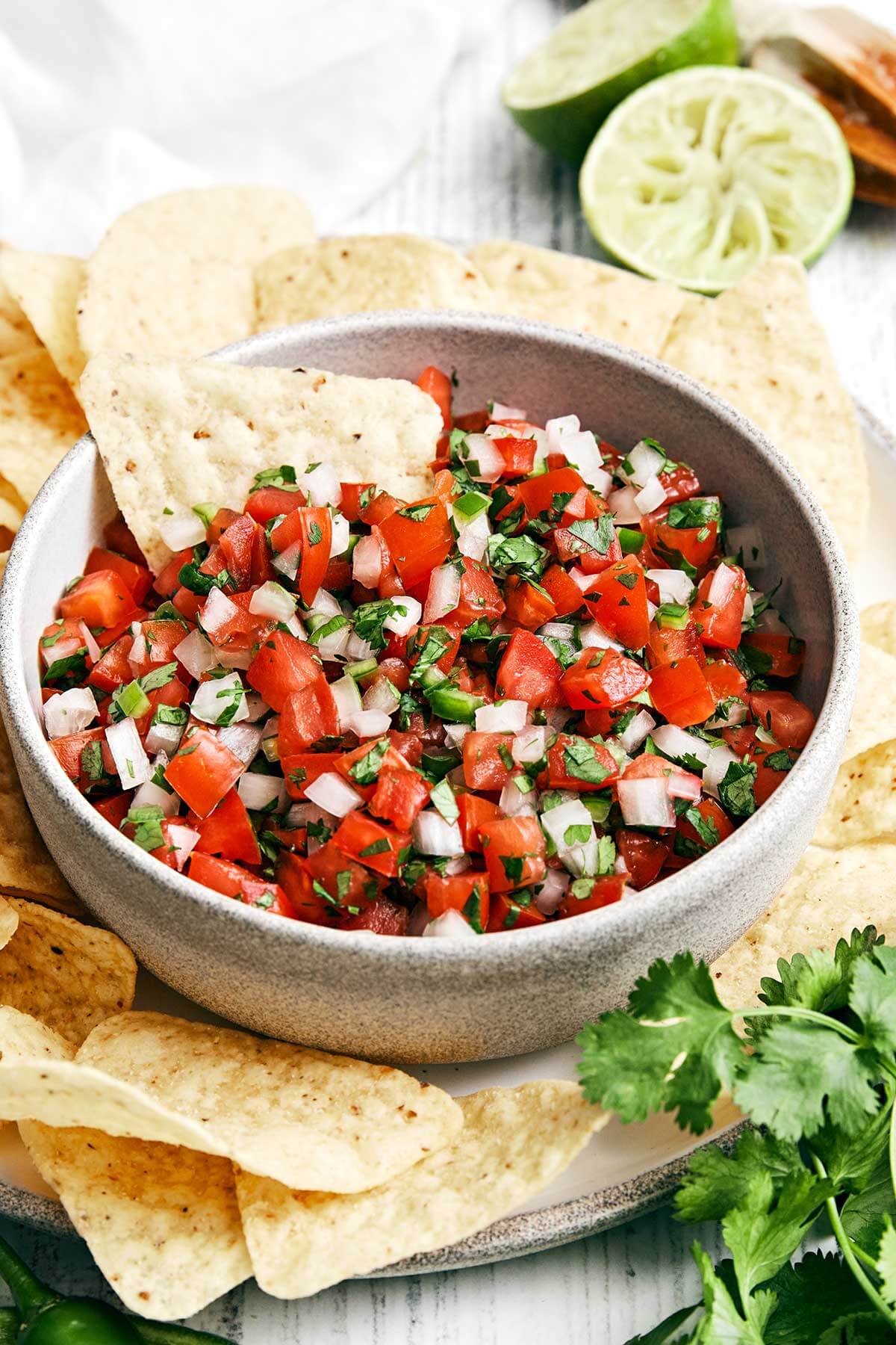 A bowl of pico de gallo salsa.