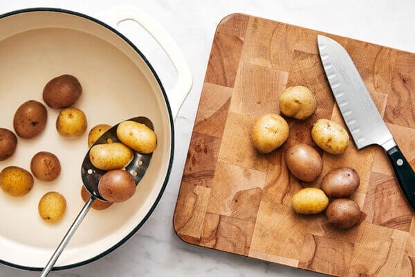 Slicing potatoes for Nicoise salad