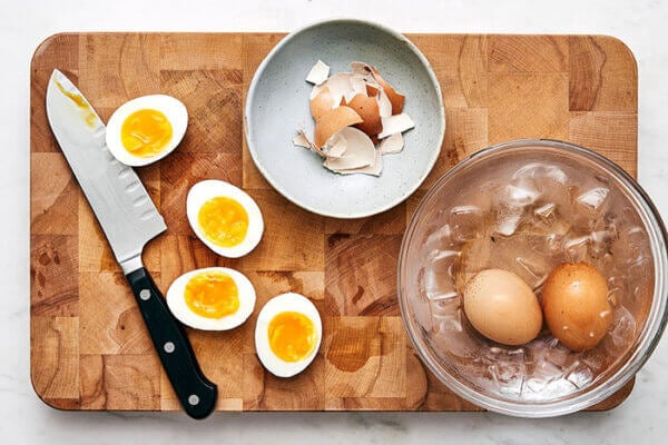 Slicing eggs for Nicoise salad