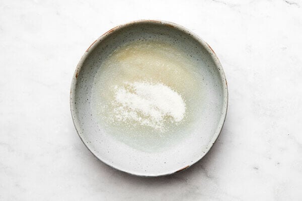 Melting gelatin in a bowl for panna cotta