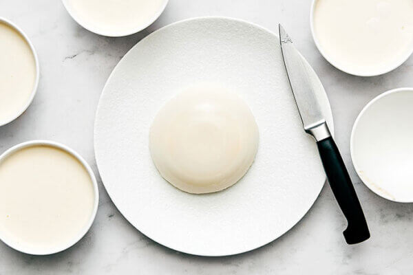Panna cotta next to a knife