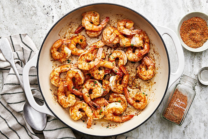 A pan with cooked Cajun shrimp