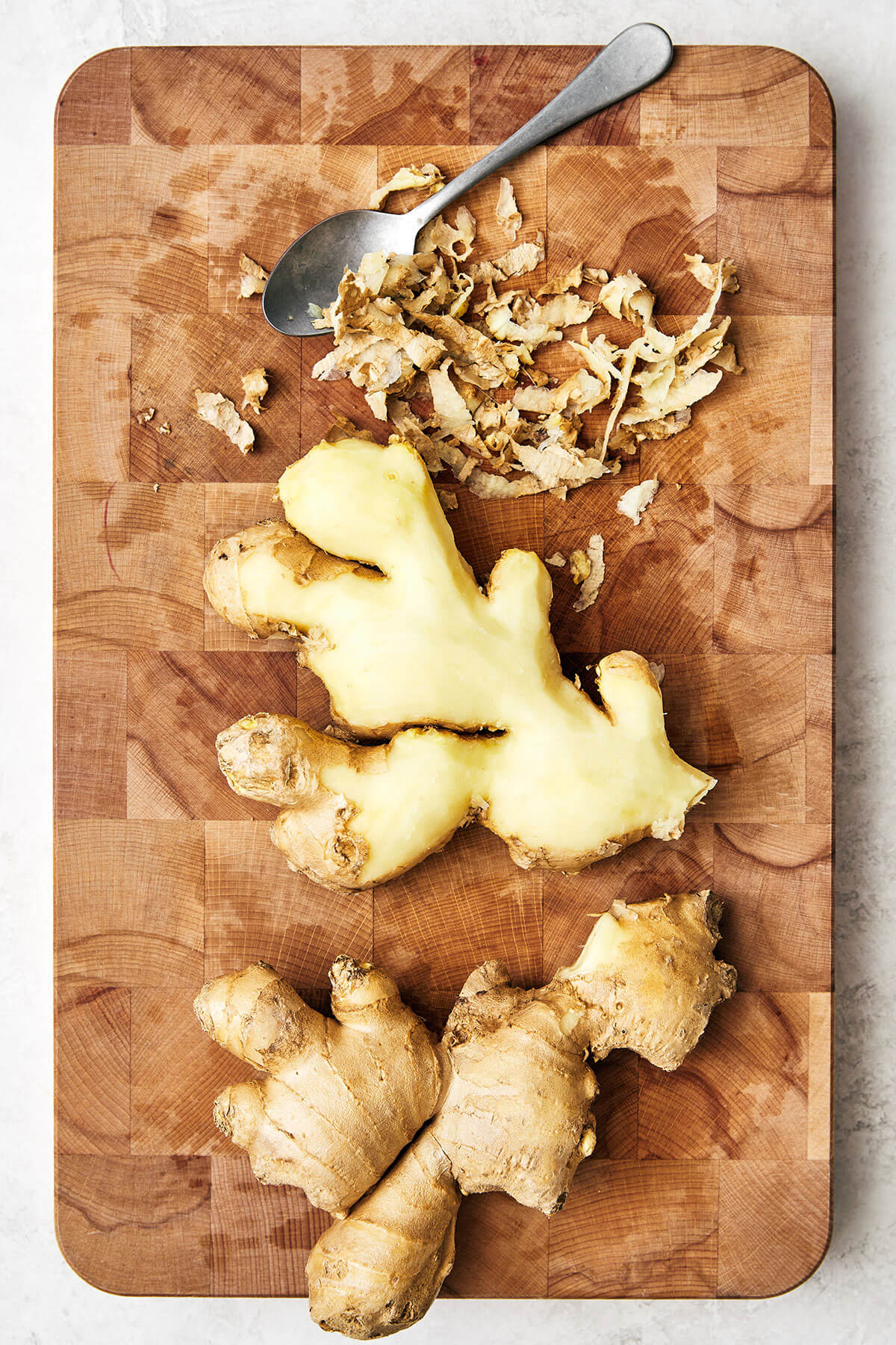 This easy homemade candied ginger is a tasty way to enjoy ginger while reaping all its shining health benefits! Peeling ginger with a spoon