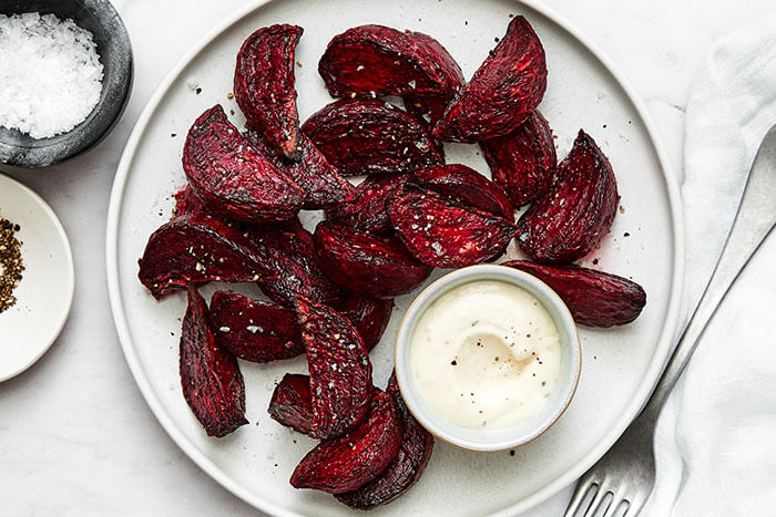 A white plate of roasted air fryer beets