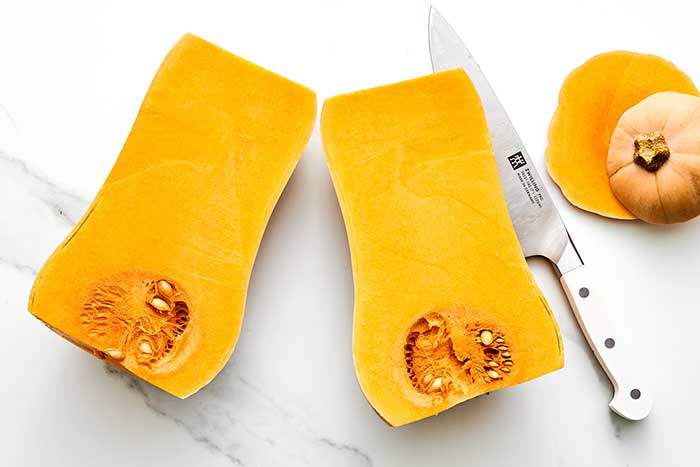 Prepping butternut squash.