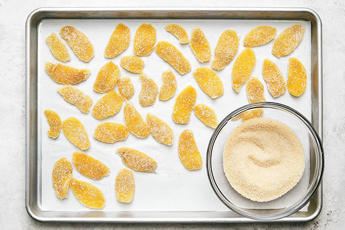 Coating candied ginger in sugar