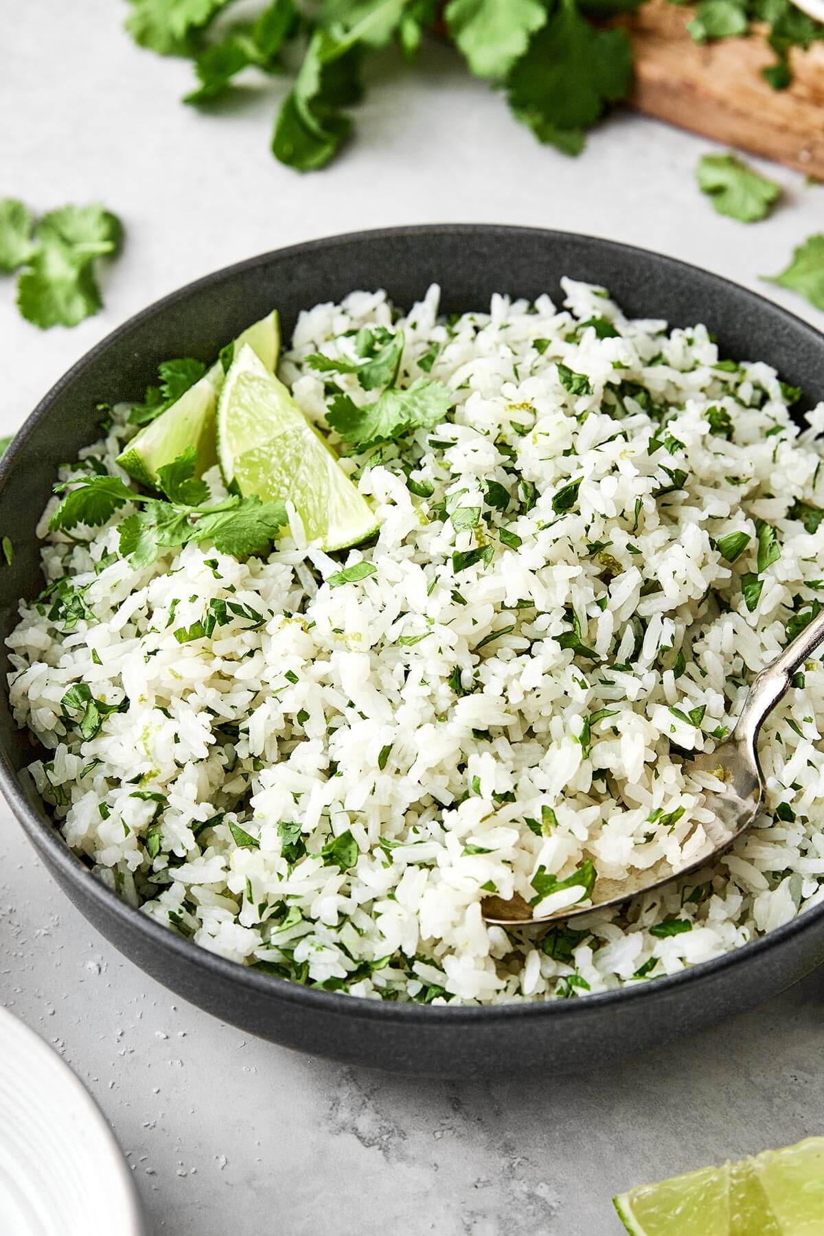 This cilantro lime rice is the best Chipotle copycat! It's bright, and zesty, and is the perfect side dish paired with Mexican mains. Cilantro lime rice in a bowl.