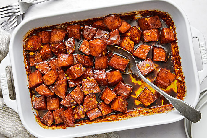 Candied yams with a spoon.